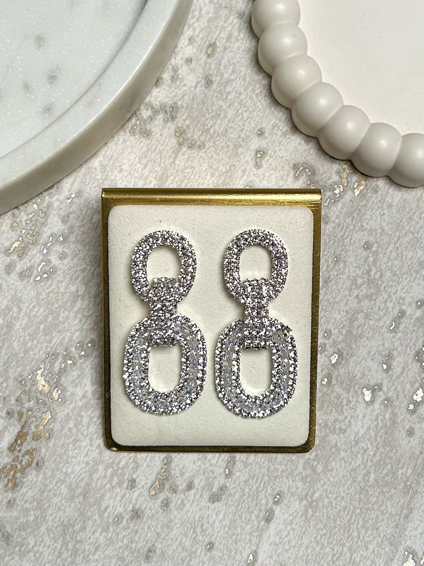 Diamante Oval Intertwined Dangle Earrings