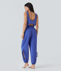 Sleeveless Cut Out Drawstring Yoga Jumpsuit with Pockets
