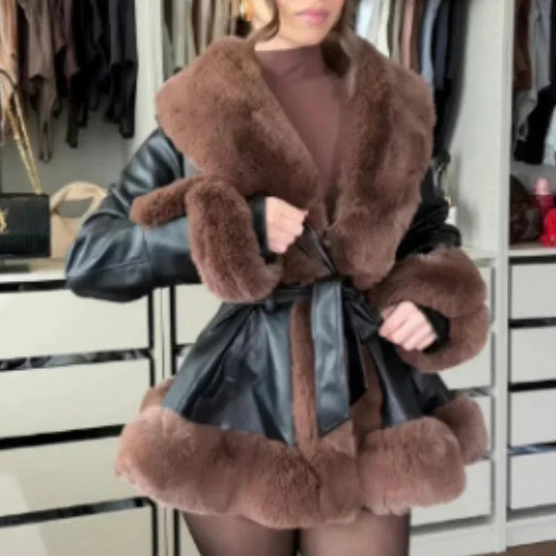 Women's coat made of faux leather with faux fur collar